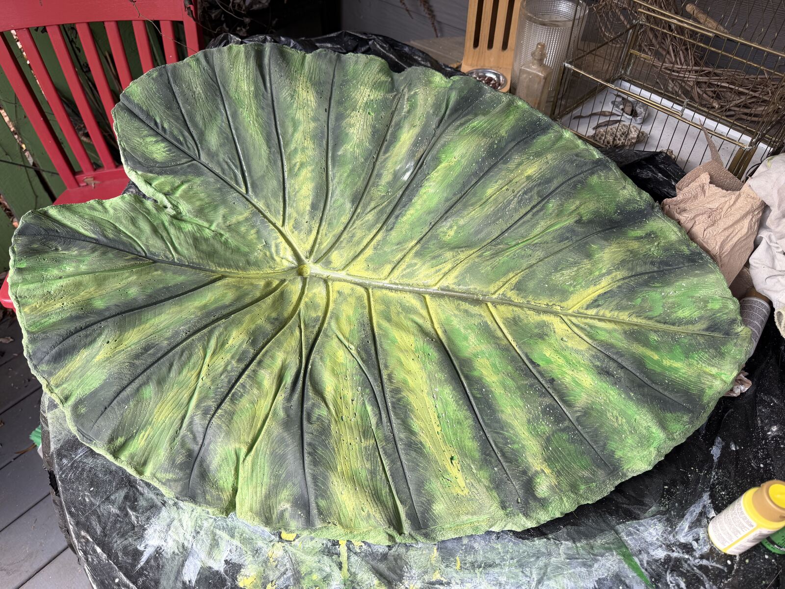 Leaf cast with yellow highlights added along the center and veins