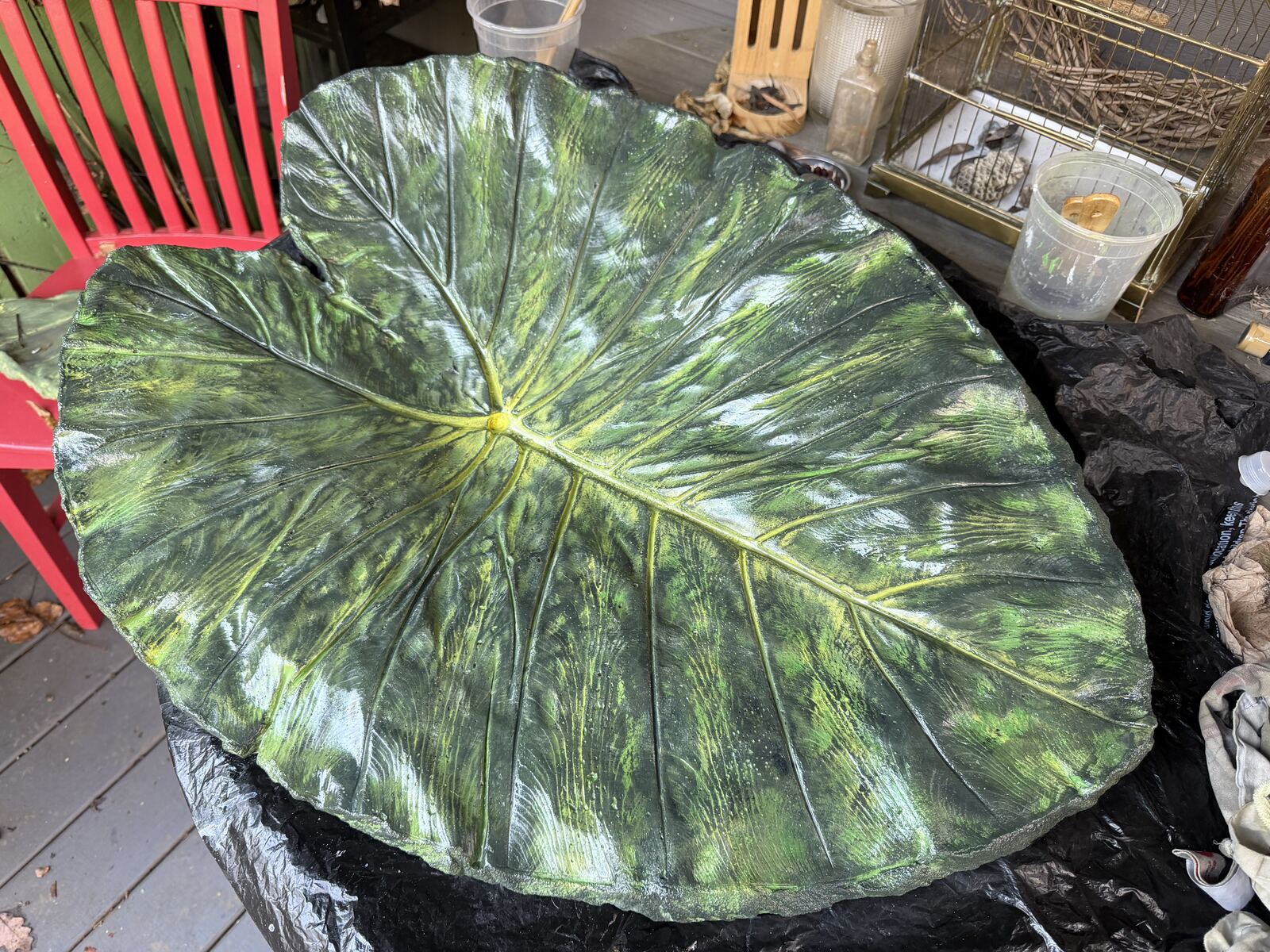 The painted leaf cast with a soft sheen after a coat of tung oil